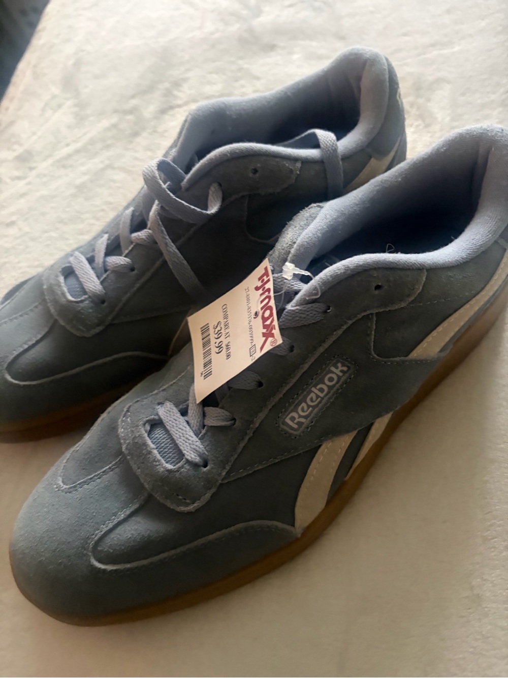 Reebok woman’s Suede Sneakers in Light Blue with White Stripe